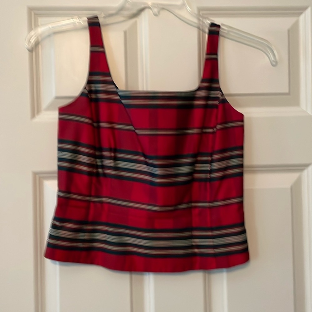 White House black market silk top
With side zipper